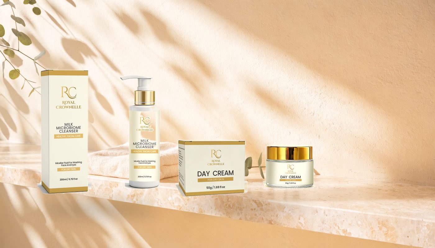 Milk Microbiome Cleanser and Day Cream on a warm stone bathroom shelf